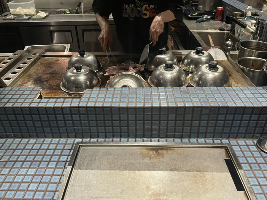 Cooking Process of Okonomiyaki on Teppan